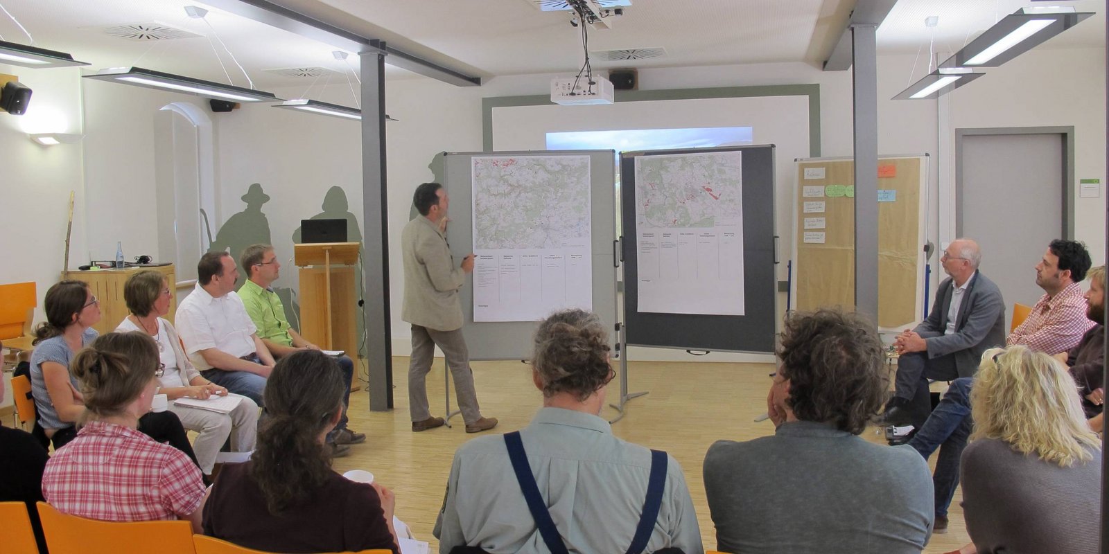 Zuschauer bei einem Vortrag zum Thema Schäferei